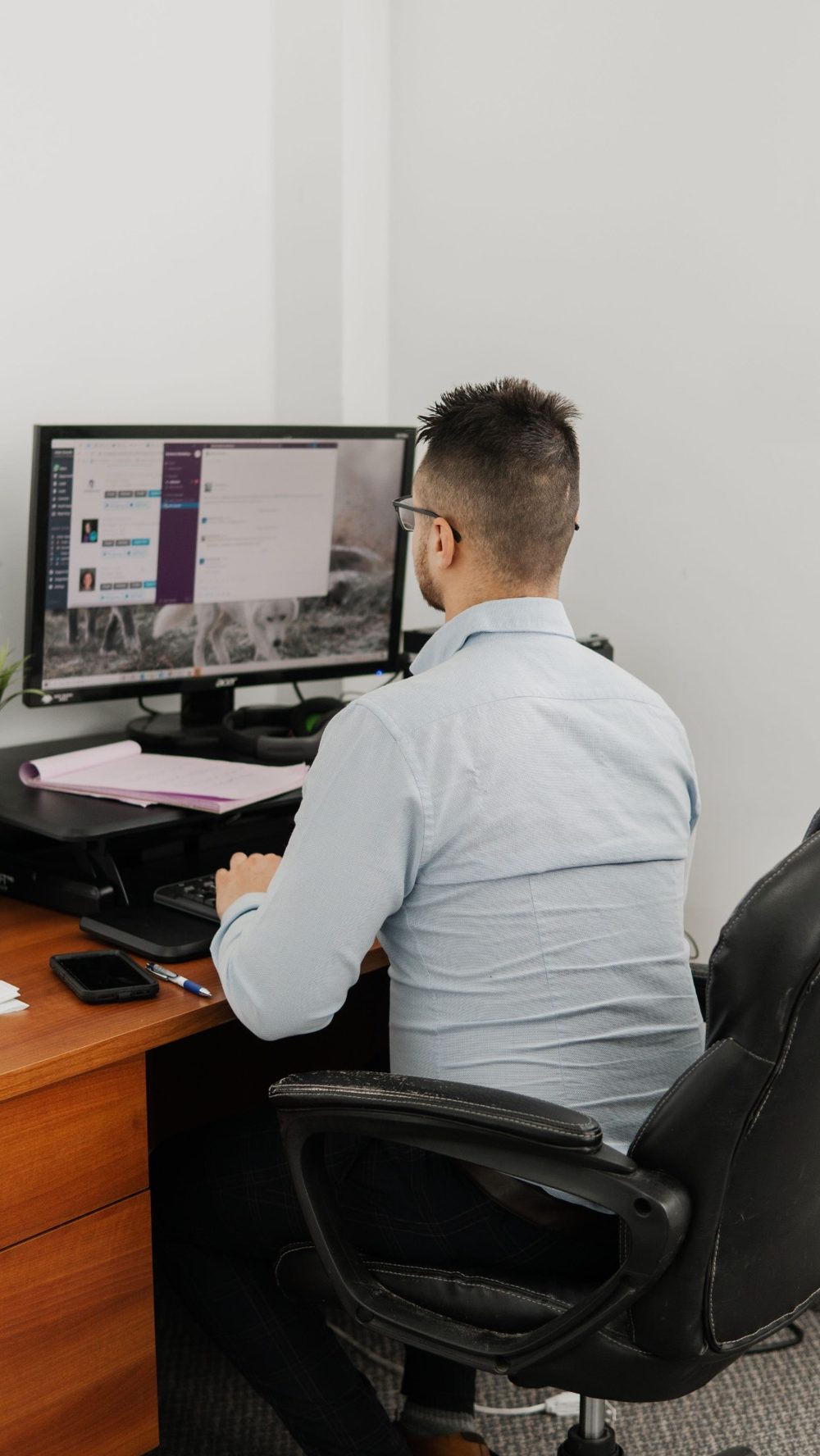A Variance Marketing team member working at his desk